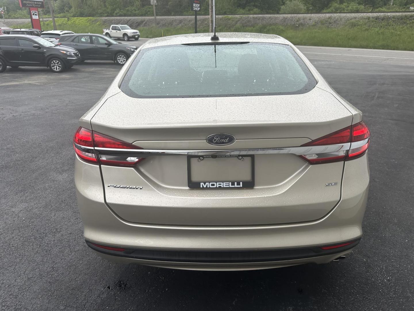 2017 Gold Ford Fusion SE (3FA6P0H78HR) with an 2.5L L4 DOHC 16V engine, 6A transmission, located at 8464 Route 219, Brockway, PA, 15824, (814) 265-1330, 41.226871, -78.780518 - Clean, well taken care of 2017 Ford Fusion SE with only 62,000 miles. This Ford Sedan is well equipped with automatic transmission, air condition, power windows and locks, power seat and factory wheels. Serviced up and ready to go. - Photo#9