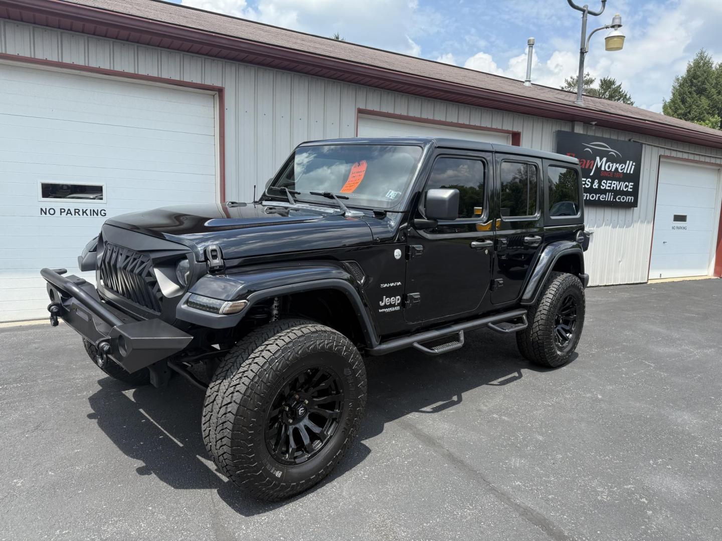 2018 Black Jeep Wrangler JK Unlimited Sahara (1C4HJXEG6JW) with an 3.6L V6 DOHC 24V FFV engine, 6A transmission, located at 8464 Route 219, Brockway, PA, 15824, (814) 265-1330, 41.226871, -78.780518 - Sharp looking pre owned 2018 Jeep Wrangler Unlimited Sahara 4wd with v6 engine, air condition, power windows and locks, hard top, lift, and much much more. Serviced and ready to retail. - Photo#0