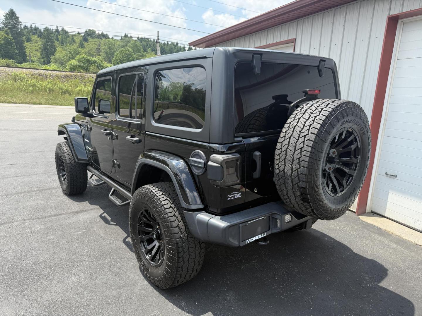 2018 Black Jeep Wrangler JK Unlimited Sahara (1C4HJXEG6JW) with an 3.6L V6 DOHC 24V FFV engine, 6A transmission, located at 8464 Route 219, Brockway, PA, 15824, (814) 265-1330, 41.226871, -78.780518 - Sharp looking pre owned 2018 Jeep Wrangler Unlimited Sahara 4wd with v6 engine, air condition, power windows and locks, hard top, lift, and much much more. Serviced and ready to retail. - Photo#11