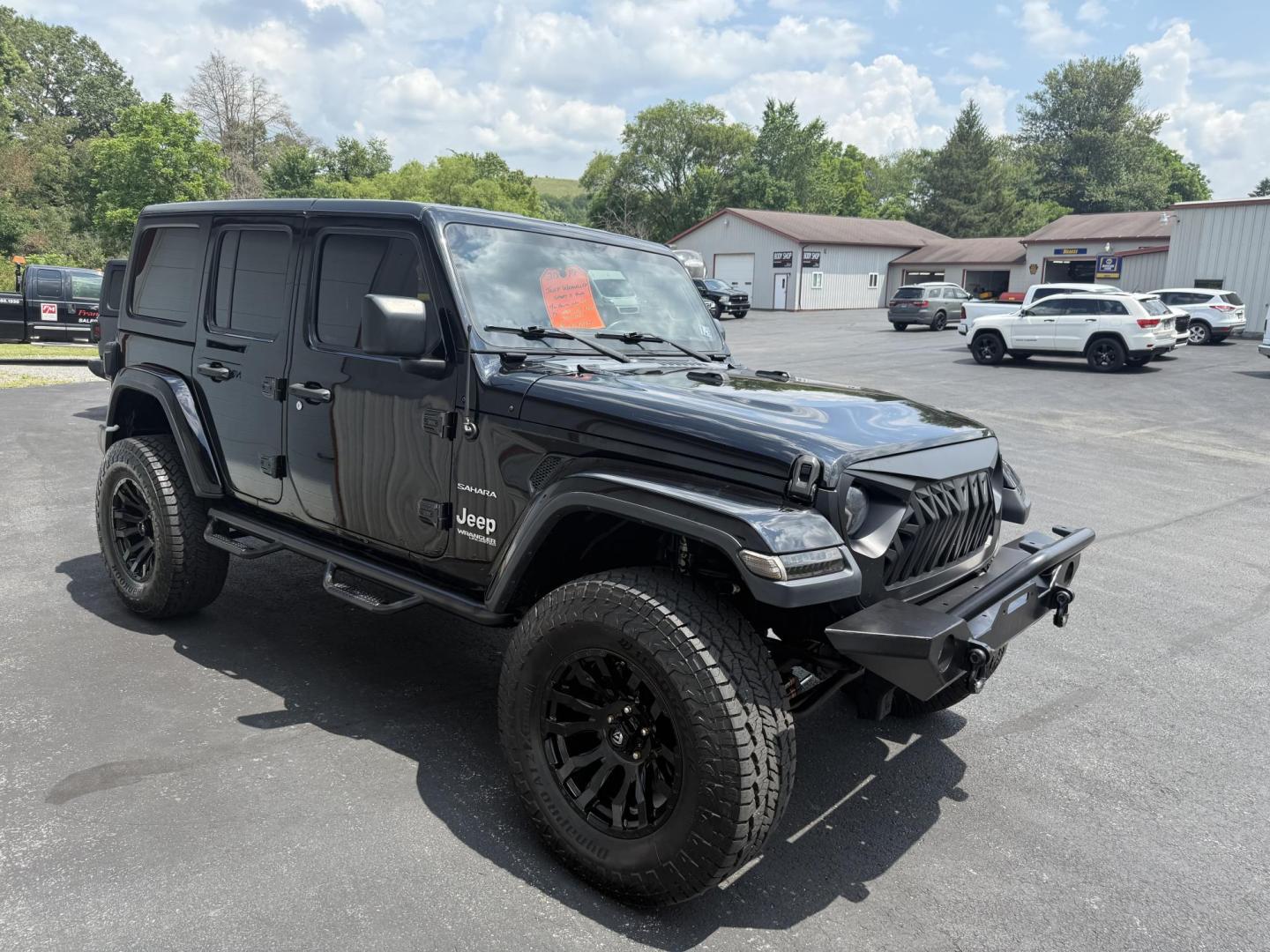 2018 Black Jeep Wrangler JK Unlimited Sahara (1C4HJXEG6JW) with an 3.6L V6 DOHC 24V FFV engine, 6A transmission, located at 8464 Route 219, Brockway, PA, 15824, (814) 265-1330, 41.226871, -78.780518 - Sharp looking pre owned 2018 Jeep Wrangler Unlimited Sahara 4wd with v6 engine, air condition, power windows and locks, hard top, lift, and much much more. Serviced and ready to retail. - Photo#19