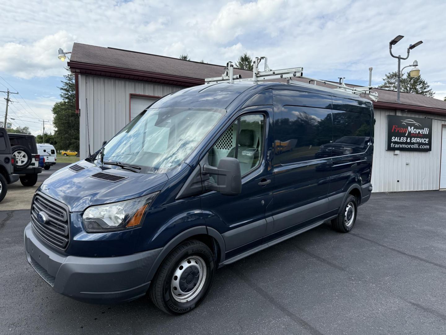 2017 Blue Ford Transit 250 Van Med. Roof w/Sliding Pass. 148-in. WB (1FTYR2CG5HK) with an 3.5L V6 DOHC 24V engine, 6A transmission, located at 8464 Route 219, Brockway, PA, 15824, (814) 265-1330, 41.226871, -78.780518 - Fresh local trade in that was bought originally here and serviced at our service dept. Lots of life left in this 2017 Ford Transit 250 cargo van with V6, automatic trans, air condition, roof rack and more. Great price, well under retail value. - Photo#0