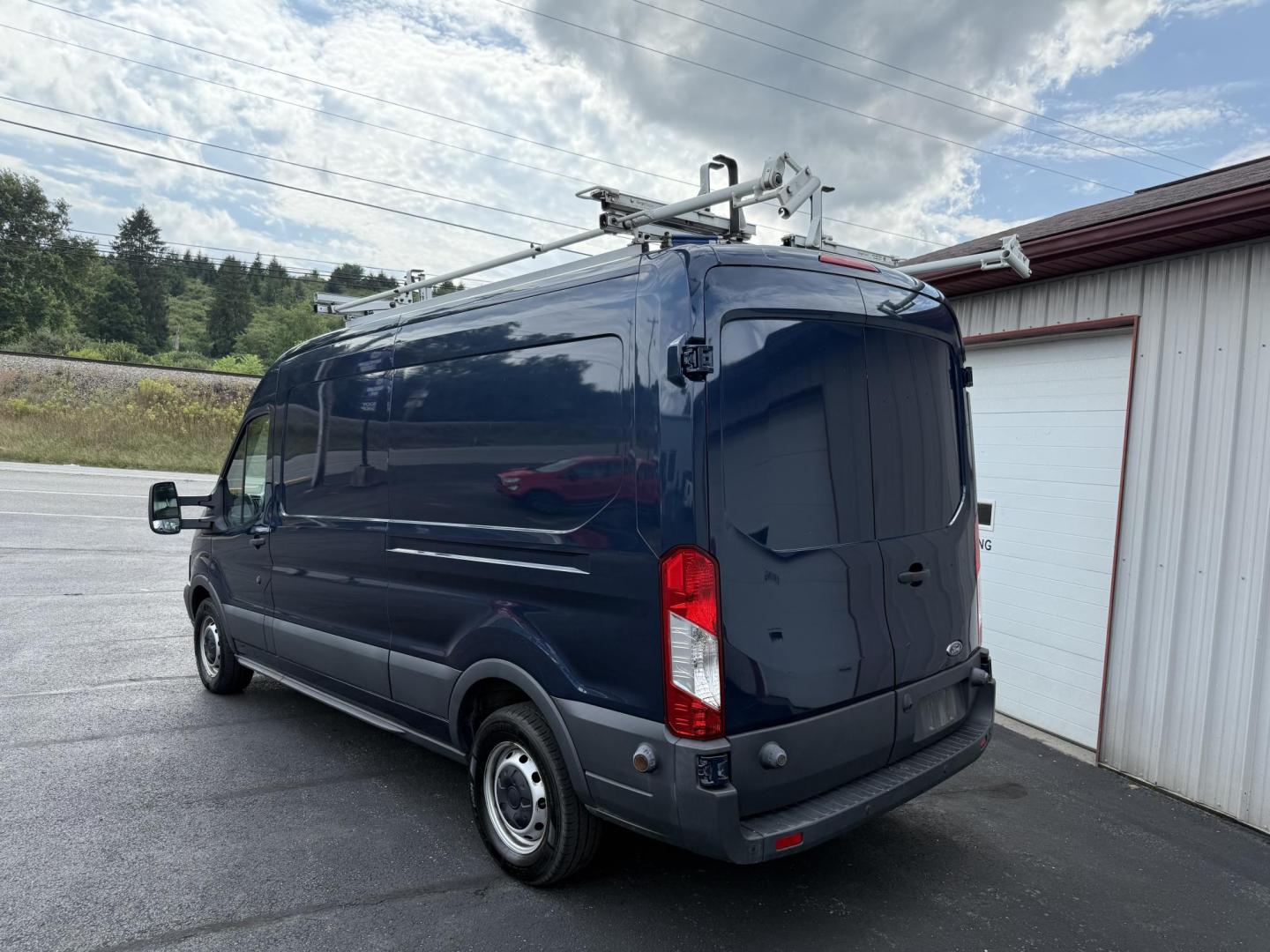 2017 Blue Ford Transit 250 Van Med. Roof w/Sliding Pass. 148-in. WB (1FTYR2CG5HK) with an 3.5L V6 DOHC 24V engine, 6A transmission, located at 8464 Route 219, Brockway, PA, 15824, (814) 265-1330, 41.226871, -78.780518 - Fresh local trade in that was bought originally here and serviced at our service dept. Lots of life left in this 2017 Ford Transit 250 cargo van with V6, automatic trans, air condition, roof rack and more. Great price, well under retail value. - Photo#6