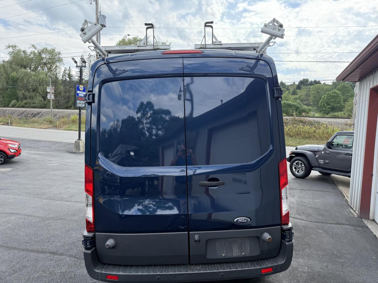 2017 Blue Ford Transit 250 Van Med. Roof w/Sliding Pass. 148-in. WB (1FTYR2CG5HK) with an 3.5L V6 DOHC 24V engine, 6A transmission, located at 8464 Route 219, Brockway, PA, 15824, (814) 265-1330, 41.226871, -78.780518 - Fresh local trade in that was bought originally here and serviced at our service dept. Lots of life left in this 2017 Ford Transit 250 cargo van with V6, automatic trans, air condition, roof rack and more. Great price, well under retail value. - Photo#7