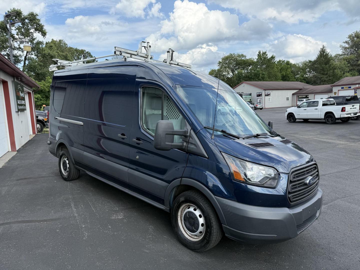 2017 Blue Ford Transit 250 Van Med. Roof w/Sliding Pass. 148-in. WB (1FTYR2CG5HK) with an 3.5L V6 DOHC 24V engine, 6A transmission, located at 8464 Route 219, Brockway, PA, 15824, (814) 265-1330, 41.226871, -78.780518 - Fresh local trade in that was bought originally here and serviced at our service dept. Lots of life left in this 2017 Ford Transit 250 cargo van with V6, automatic trans, air condition, roof rack and more. Great price, well under retail value. - Photo#16