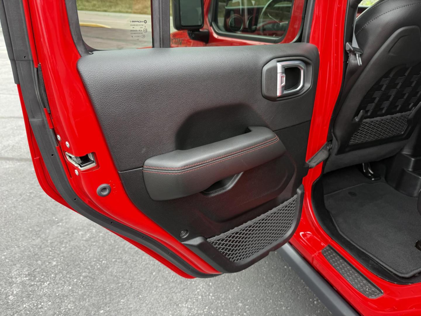2021 Red Jeep Wrangler Unlimited Rubicon (1C4HJXFG4MW) with an 3.6L V6 DOHC 24V FFV engine, 6A transmission, located at 8464 Route 219, Brockway, PA, 15824, (814) 265-1330, 41.226871, -78.780518 - MUST SEE 2021 JEEP WRANGELR UNLIMITED RUBICON...just arrived. This Jeep is like new with 3.6 engine, leather interior, big screen radio, matching hard top, left, and ONLY 22700 miles. This Jeep is priced well under retail value, so hurry in before it's gone. Serviced up and comes with warranty. - Photo#18
