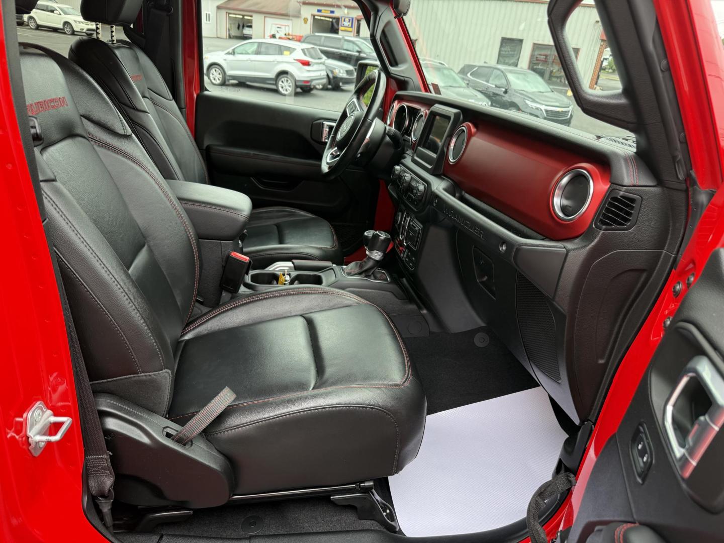 2021 Red Jeep Wrangler Unlimited Rubicon (1C4HJXFG4MW) with an 3.6L V6 DOHC 24V FFV engine, 6A transmission, located at 8464 Route 219, Brockway, PA, 15824, (814) 265-1330, 41.226871, -78.780518 - MUST SEE 2021 JEEP WRANGELR UNLIMITED RUBICON...just arrived. This Jeep is like new with 3.6 engine, leather interior, big screen radio, matching hard top, left, and ONLY 22700 miles. This Jeep is priced well under retail value, so hurry in before it's gone. Serviced up and comes with warranty. - Photo#24