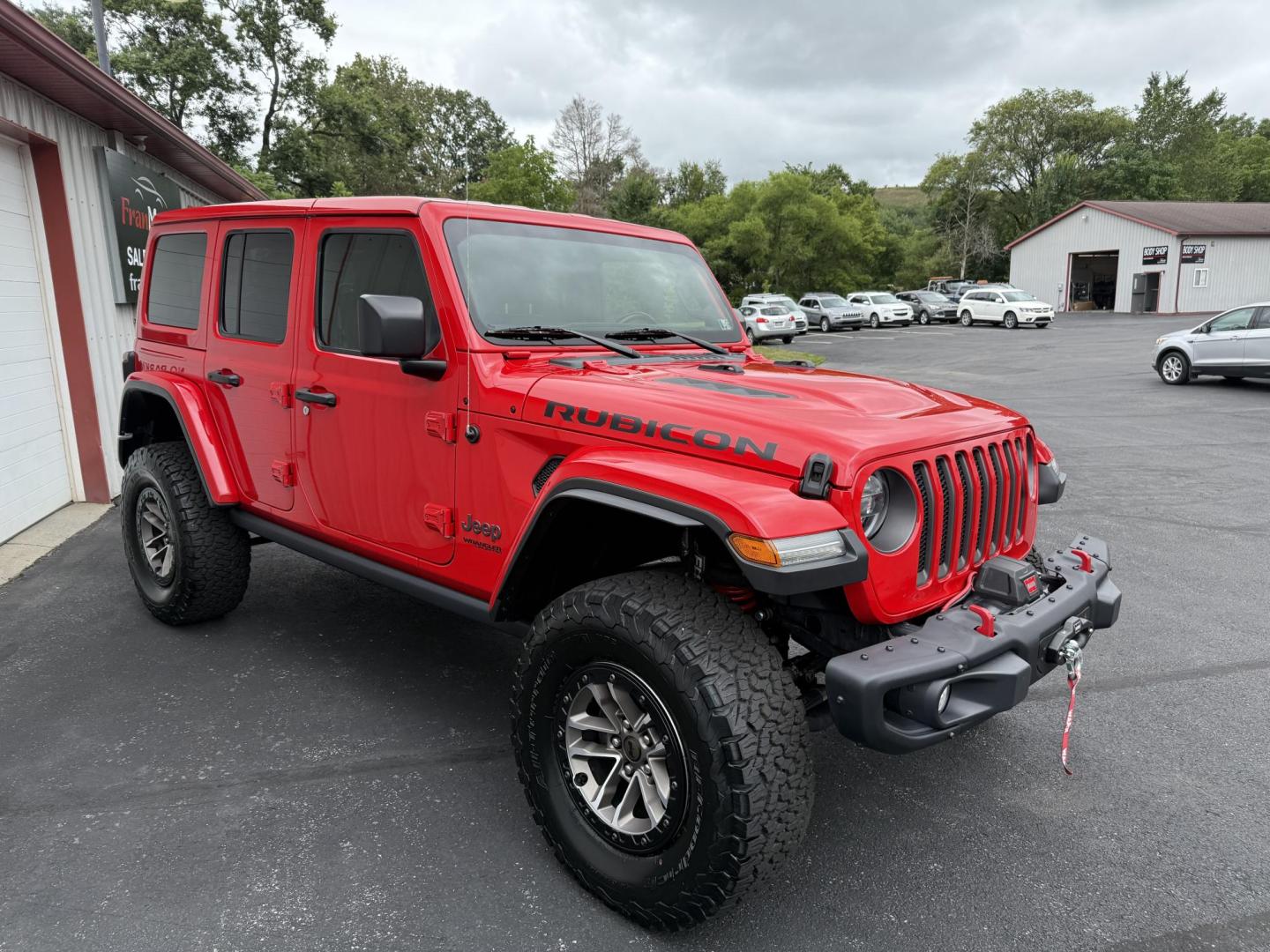 2021 Red Jeep Wrangler Unlimited Rubicon (1C4HJXFG4MW) with an 3.6L V6 DOHC 24V FFV engine, 6A transmission, located at 8464 Route 219, Brockway, PA, 15824, (814) 265-1330, 41.226871, -78.780518 - MUST SEE 2021 JEEP WRANGELR UNLIMITED RUBICON...just arrived. This Jeep is like new with 3.6 engine, leather interior, big screen radio, matching hard top, left, and ONLY 22700 miles. This Jeep is priced well under retail value, so hurry in before it's gone. Serviced up and comes with warranty. - Photo#27