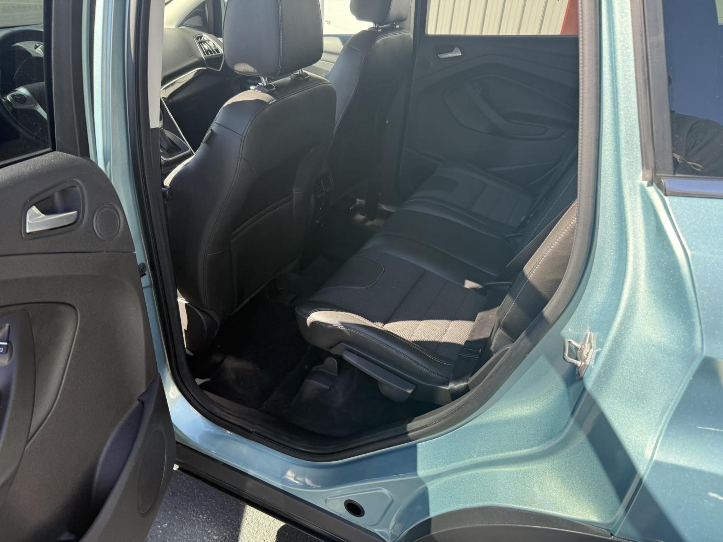 2013 Green Ford Escape Titanium 4WD (1FMCU9J93DU) with an 2.0L L4 DOHC 16V engine, 6-Speed Automatic transmission, located at 8464 Route 219, Brockway, PA, 15824, (814) 265-1330, 41.226871, -78.780518 - Local vehicle in very nice shape and has very low miles. This 2013 Ford Escape Titanium has cloth/leather trimed seating with pwr/heated front seats, big screen radio with back up camera, hitch and only 74900 miles. - Photo#7