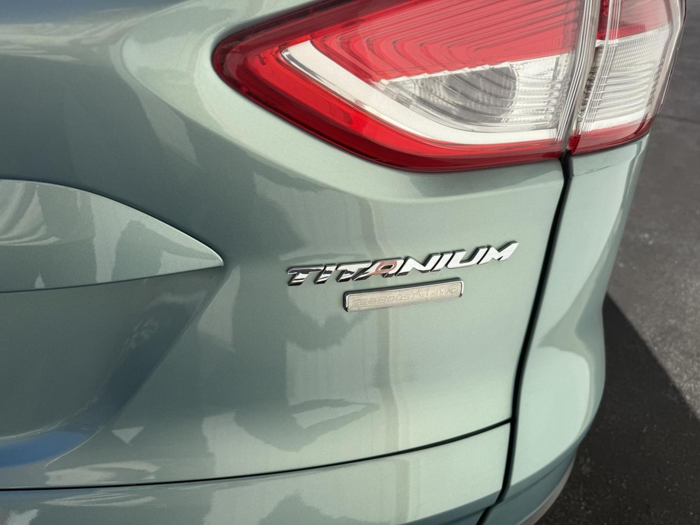2013 Green Ford Escape Titanium 4WD (1FMCU9J93DU) with an 2.0L L4 DOHC 16V engine, 6-Speed Automatic transmission, located at 8464 Route 219, Brockway, PA, 15824, (814) 265-1330, 41.226871, -78.780518 - Local vehicle in very nice shape and has very low miles. This 2013 Ford Escape Titanium has cloth/leather trimed seating with pwr/heated front seats, big screen radio with back up camera, hitch and only 74900 miles. - Photo#11