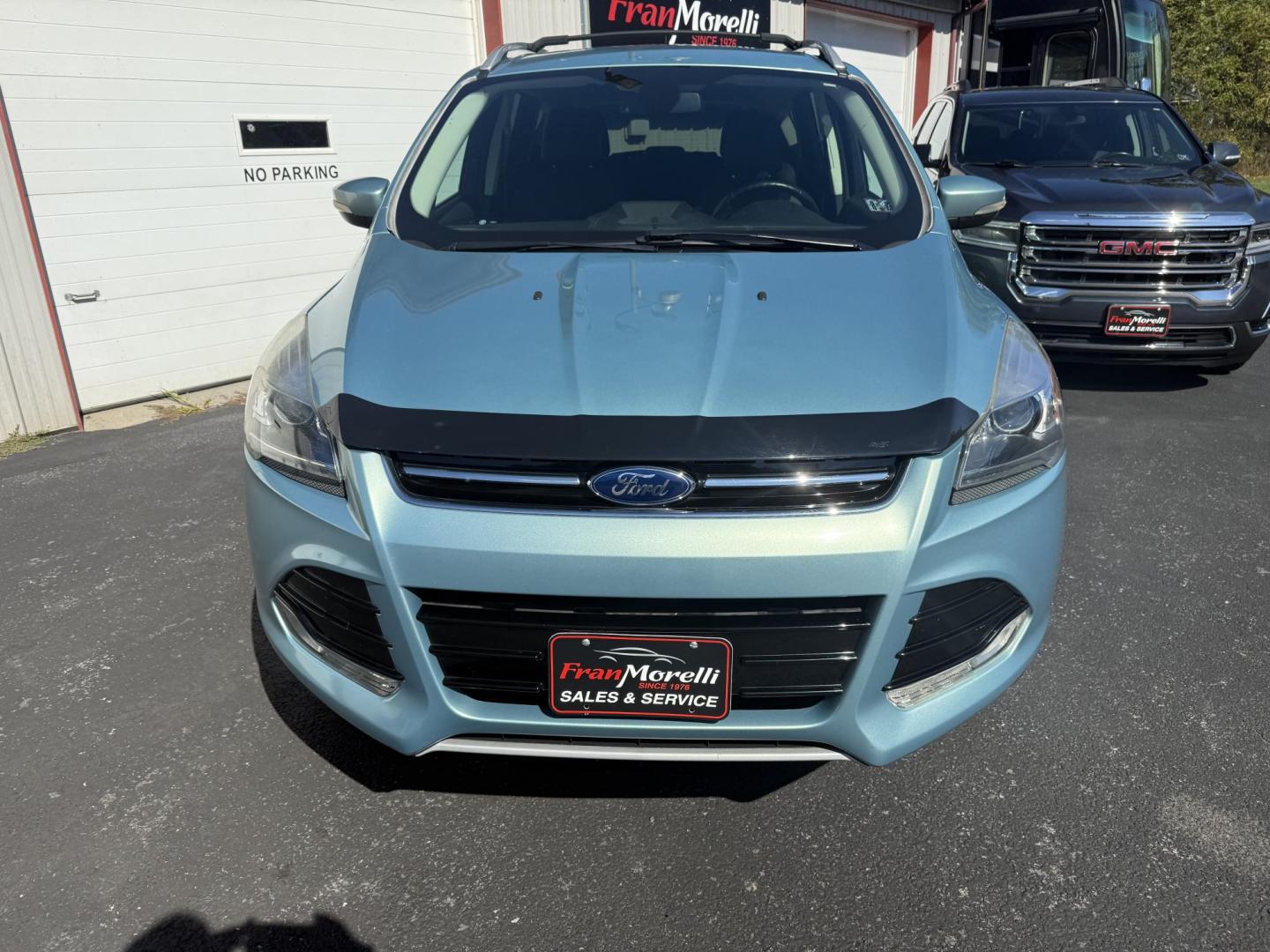 2013 Green Ford Escape Titanium 4WD (1FMCU9J93DU) with an 2.0L L4 DOHC 16V engine, 6-Speed Automatic transmission, located at 8464 Route 219, Brockway, PA, 15824, (814) 265-1330, 41.226871, -78.780518 - Local vehicle in very nice shape and has very low miles. This 2013 Ford Escape Titanium has cloth/leather trimed seating with pwr/heated front seats, big screen radio with back up camera, hitch and only 74900 miles. - Photo#20