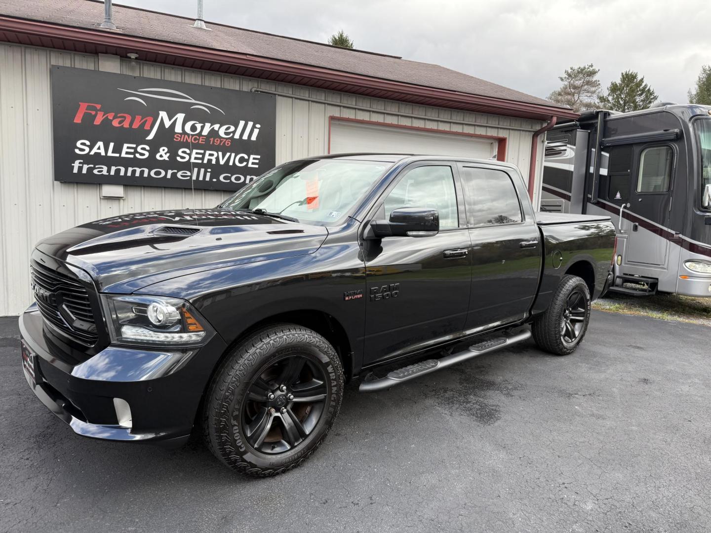 2018 Black RAM 1500 Sport Crew Cab SWB 4WD (1C6RR7MT2JS) with an 5.7L V8 OHV 16V engine, 8A transmission, located at 8464 Route 219, Brockway, PA, 15824, (814) 265-1330, 41.226871, -78.780518 - ONE SHARP TRUCK...2018 Ram 1500 Crew Cab Sport 4wd with HEMI, a/c, power/heated front seats, navigation, sunroof, hitch, 20's, bed cover, and only 55000 miles. This Ram truck is serviced and ready to go...save thousands from retail value. - Photo#0