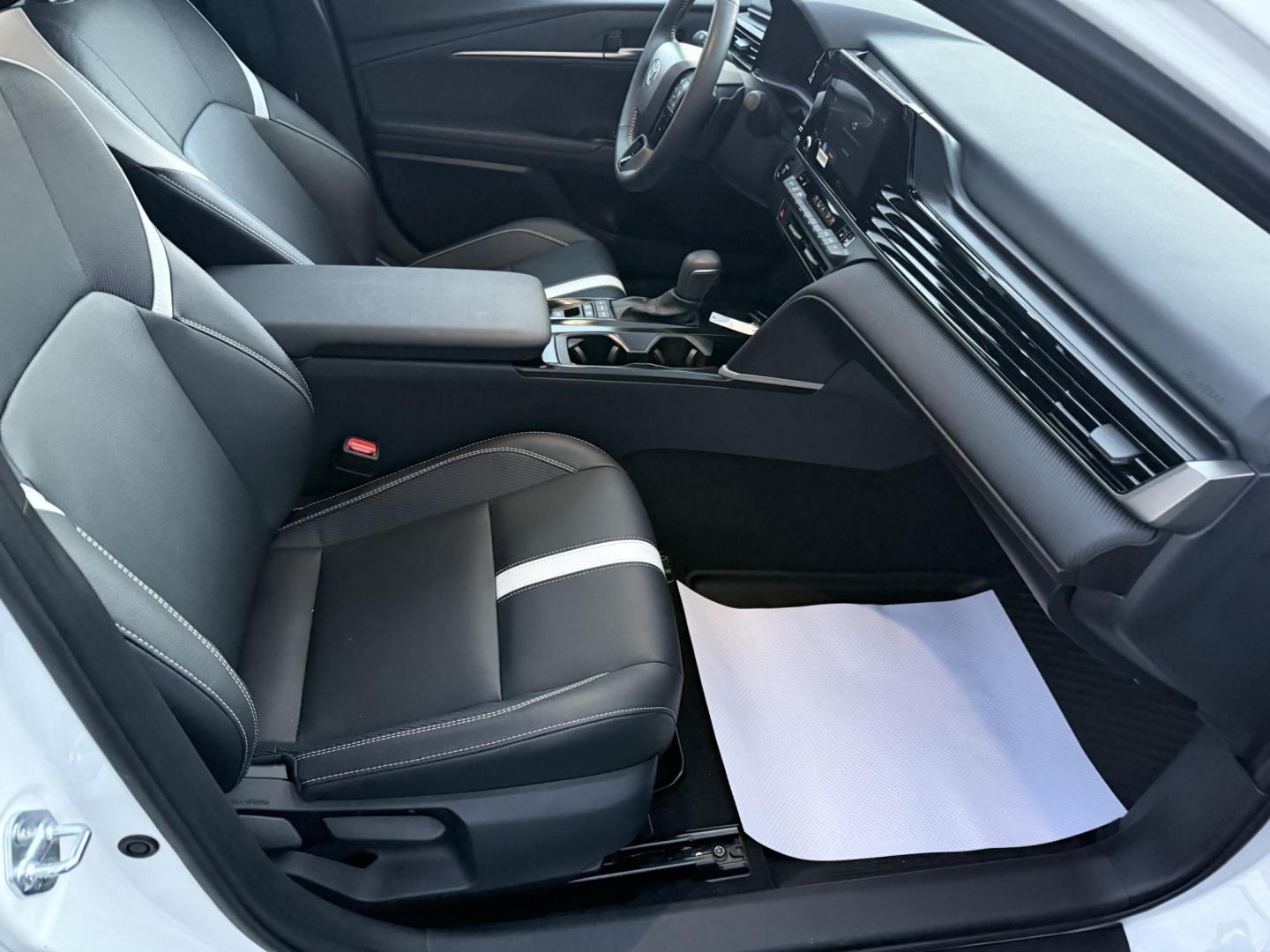 2026 White Toyota Camry Hybrid SE AWD (4T1DBADK7TU) with an 2.5L L4 DOHC 16V HYBRID engine, 1A transmission, located at 8464 Route 219, Brockway, PA, 15824, (814) 265-1330, 41.226871, -78.780518 - Must see 2026 Toyota Camry Nightline pkg ALL WHEEL DRIVE well equipped with leather interior, power/heated front seats, sunroof and much more. Local trade that was over$37000 new. Hurry in this one won't last long. Lots of factory warranty remaining. Serviced up. - Photo#14