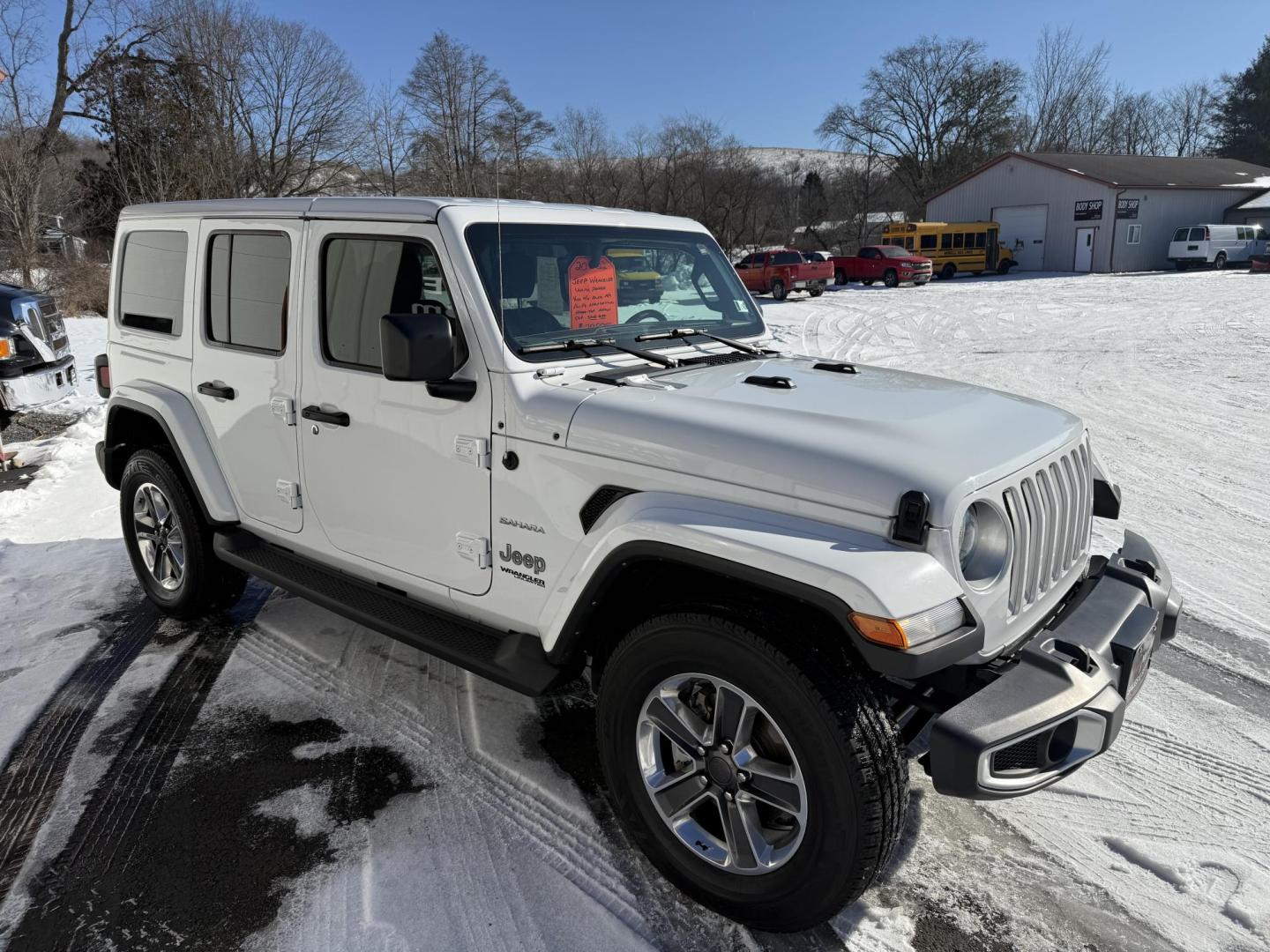 2022 White Jeep Wrangler Unlimited Sahara (1C4HJXEG4NW) with an 3.6L V6 DOHC 24V FFV engine, 6A transmission, located at 8464 Route 219, Brockway, PA, 15824, (814) 265-1330, 41.226871, -78.780518 - Super, clean 2022 Jeep Wrangler Unlimited Sahara 4wd well equipped and very sharp. Well equipped, with V6 engine, air condition, power windows and locks, matching hard top and much more. This Jeep is serviced, warranted and priced to sell. - Photo#18