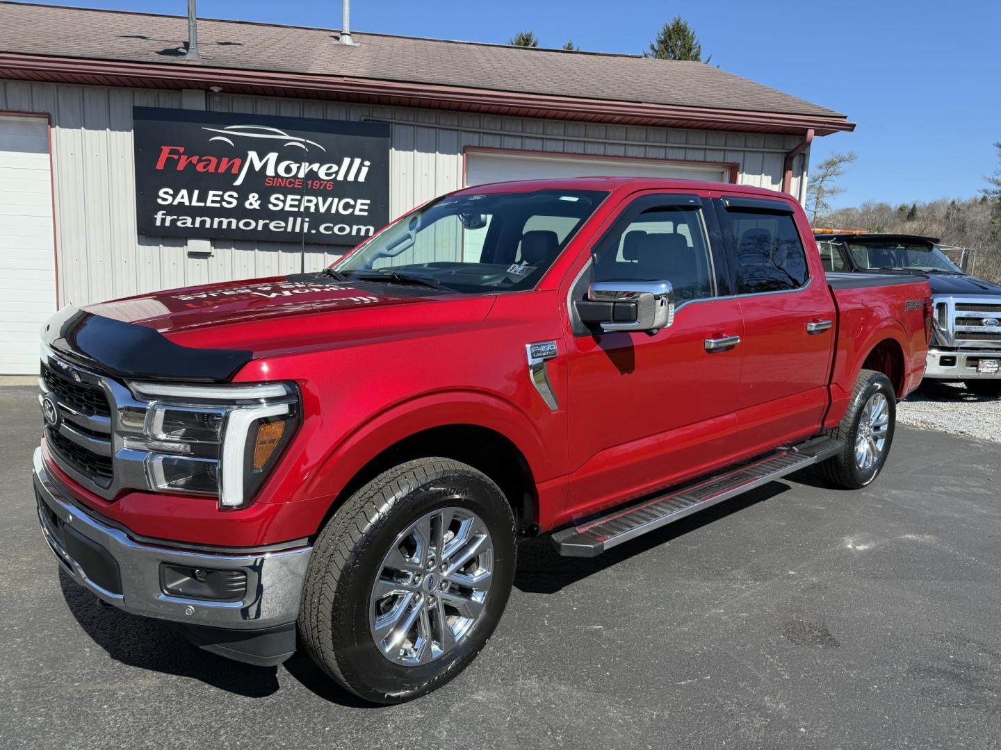 2025 Red Ford F-150 Lariat SuperCrew 4WD (1FTFW5L87SF) with an 3.5 V6 engine, 6A transmission, located at 8464 Route 219, Brockway, PA, 15824, (814) 265-1330, 41.226871, -78.780518 - Local 1-owner 2025 Ford F150 Crew Cab Lariat with ONLY 4300 miles. This truck stickered new for $70,000. Leather interior with cool/heated/power front seats. Navigation, 3.5/V6 Ecoboost, air condition, power equipment, tow package, bed cover/liner, Rear sliding window and much more. This Ford truck - Photo#0
