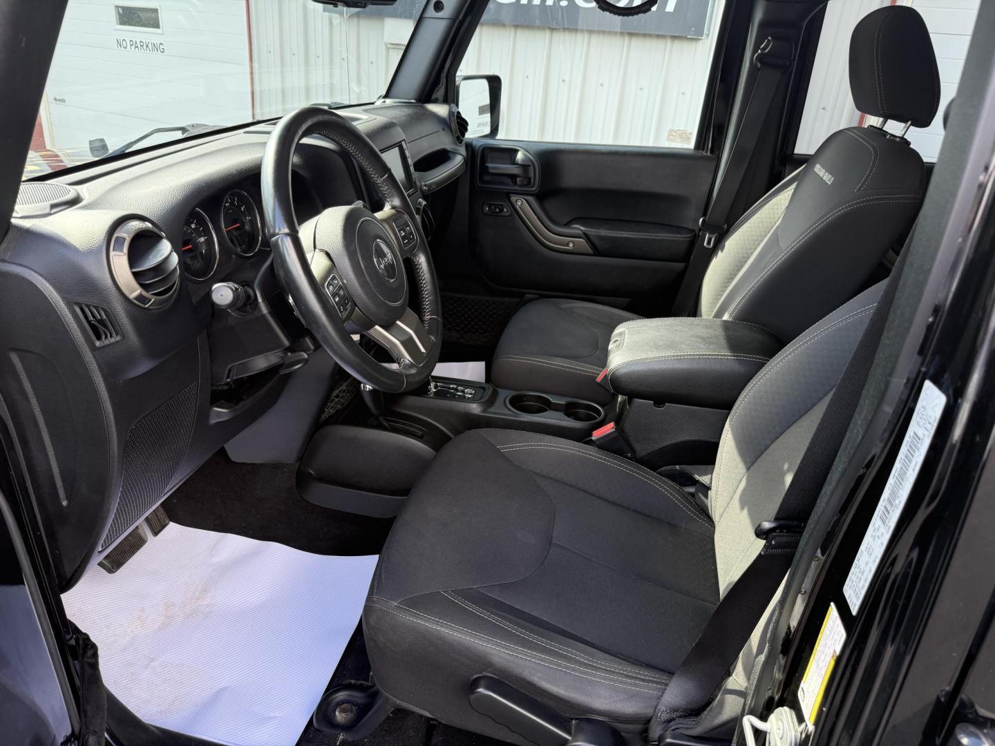 2018 Black Jeep Wrangler Unlimited Sport 4WD (1C4BJWDGXJL) with an 3.6L V6 DOHC 24V FFV engine, located at 8464 Route 219, Brockway, PA, 15824, (814) 265-1330, 41.226871, -78.780518 - Sharp looking 2018 Jeep Wrangler Unlimited 4x4 with good miles, well equipped, and ready to sell. This Jeep suv has a matching hard top, automatic, V6, air condition, power windows and locks, Golden Eagle package and much more. Clean, well taken care of and priced to sell! - Photo#4