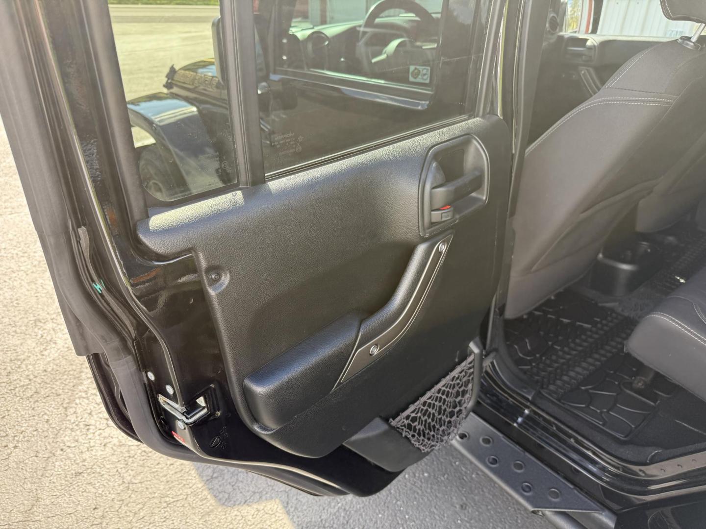 2018 Black Jeep Wrangler Unlimited Sport 4WD (1C4BJWDGXJL) with an 3.6L V6 DOHC 24V FFV engine, located at 8464 Route 219, Brockway, PA, 15824, (814) 265-1330, 41.226871, -78.780518 - Sharp looking 2018 Jeep Wrangler Unlimited 4x4 with good miles, well equipped, and ready to sell. This Jeep suv has a matching hard top, automatic, V6, air condition, power windows and locks, Golden Eagle package and much more. Clean, well taken care of and priced to sell! - Photo#7