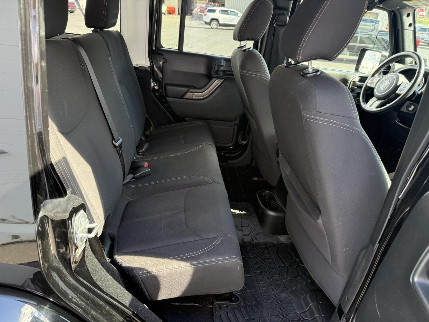 2018 Black Jeep Wrangler Unlimited Sport 4WD (1C4BJWDGXJL) with an 3.6L V6 DOHC 24V FFV engine, located at 8464 Route 219, Brockway, PA, 15824, (814) 265-1330, 41.226871, -78.780518 - Sharp looking 2018 Jeep Wrangler Unlimited 4x4 with good miles, well equipped, and ready to sell. This Jeep suv has a matching hard top, automatic, V6, air condition, power windows and locks, Golden Eagle package and much more. Clean, well taken care of and priced to sell! - Photo#12