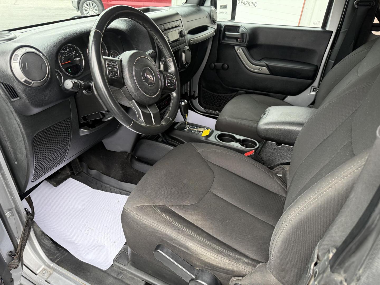 2015 Silver Jeep Wrangler Sport 4WD (1C4GJWAG9FL) with an 3.6L V6 DOHC 24V FFV engine, located at 8464 Route 219, Brockway, PA, 15824, (814) 265-1330, 41.226871, -78.780518 - Good looking pre owned 2015 Jeep Wrangler Sport 4wd with V6, air condition, soft top, factory wheels and ONLY 67000 miles. This Jeep is serviced and ready for delivery. Priced to sell, so hurry in this one won't last long. - Photo#4