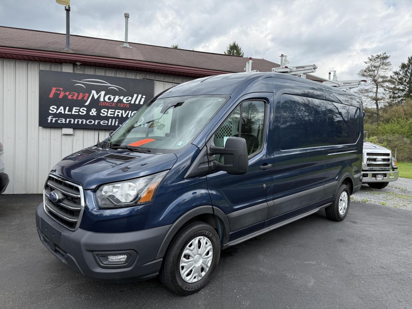 2020 Blue Ford Transit 250 Van Med. Roof w/Sliding Pass. 130-in. WB (1FTBR1CG7LK) with an 3.5L V6 DOHC 24V engine, 6A transmission, located at 8464 Route 219, Brockway, PA, 15824, (814) 265-1330, 41.226871, -78.780518 - Hard to find van and we have the right one...Stop in and check out this 2020 Ford T250 Med roof with ladder racks and inside bins. Good price and nice shape. - Photo#0