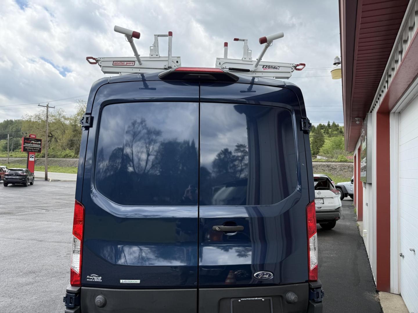 2020 Blue Ford Transit 250 Van Med. Roof w/Sliding Pass. 130-in. WB (1FTBR1CG7LK) with an 3.5L V6 DOHC 24V engine, 6A transmission, located at 8464 Route 219, Brockway, PA, 15824, (814) 265-1330, 41.226871, -78.780518 - Hard to find van and we have the right one...Stop in and check out this 2020 Ford T250 Med roof with ladder racks and inside bins. Good price and nice shape. - Photo#8