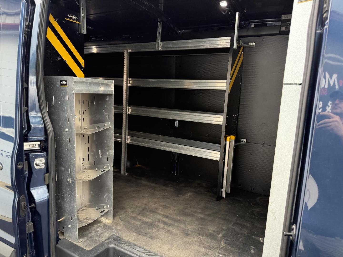 2020 Blue Ford Transit 250 Van Med. Roof w/Sliding Pass. 130-in. WB (1FTBR1CG7LK) with an 3.5L V6 DOHC 24V engine, 6A transmission, located at 8464 Route 219, Brockway, PA, 15824, (814) 265-1330, 41.226871, -78.780518 - Hard to find van and we have the right one...Stop in and check out this 2020 Ford T250 Med roof with ladder racks and inside bins. Good price and nice shape. - Photo#12