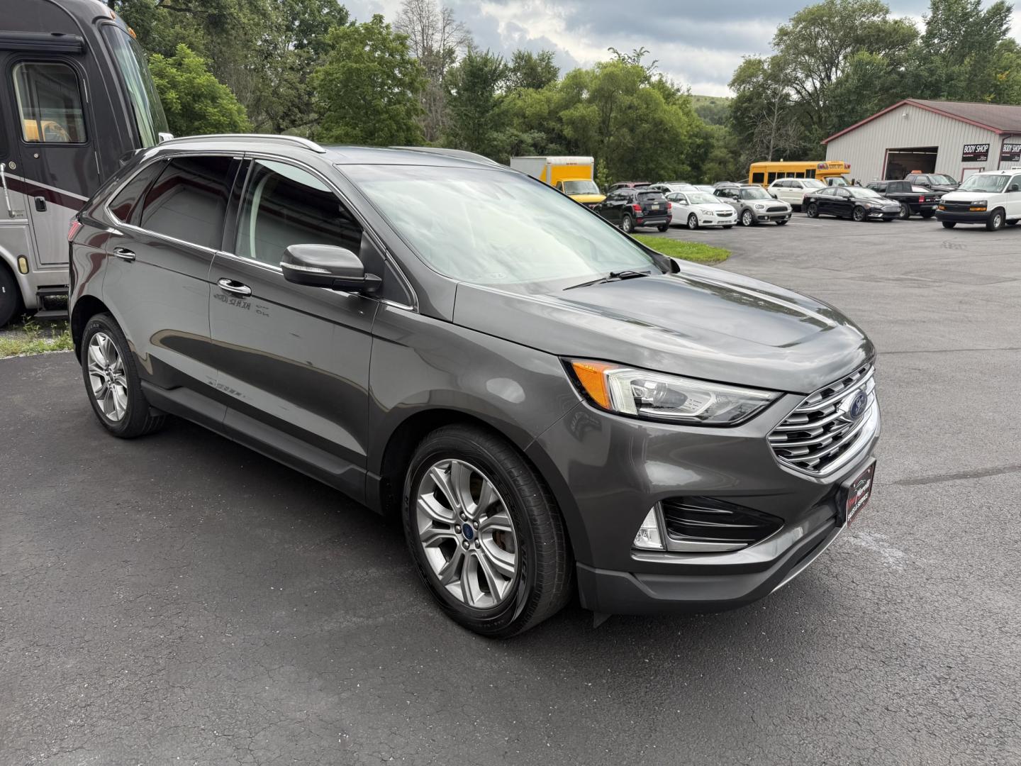 2019 Gray Ford Edge Titanium AWD (2FMPK4K94KB) with an 2.0L L4 DOHC 16V engine, 6A transmission, located at 8464 Route 219, Brockway, PA, 15824, (814) 265-1330, 41.226871, -78.780518 - Well taken care of fresh trade well equipped and very low miles..This 2019 Ford Edge Titanium has all wheel drive, leather interior with power/heated front seats, navigation, back up camera, factory wheels and ONLY 55000 miles. This Ford is priced to sell and serviced up.- Photo#19