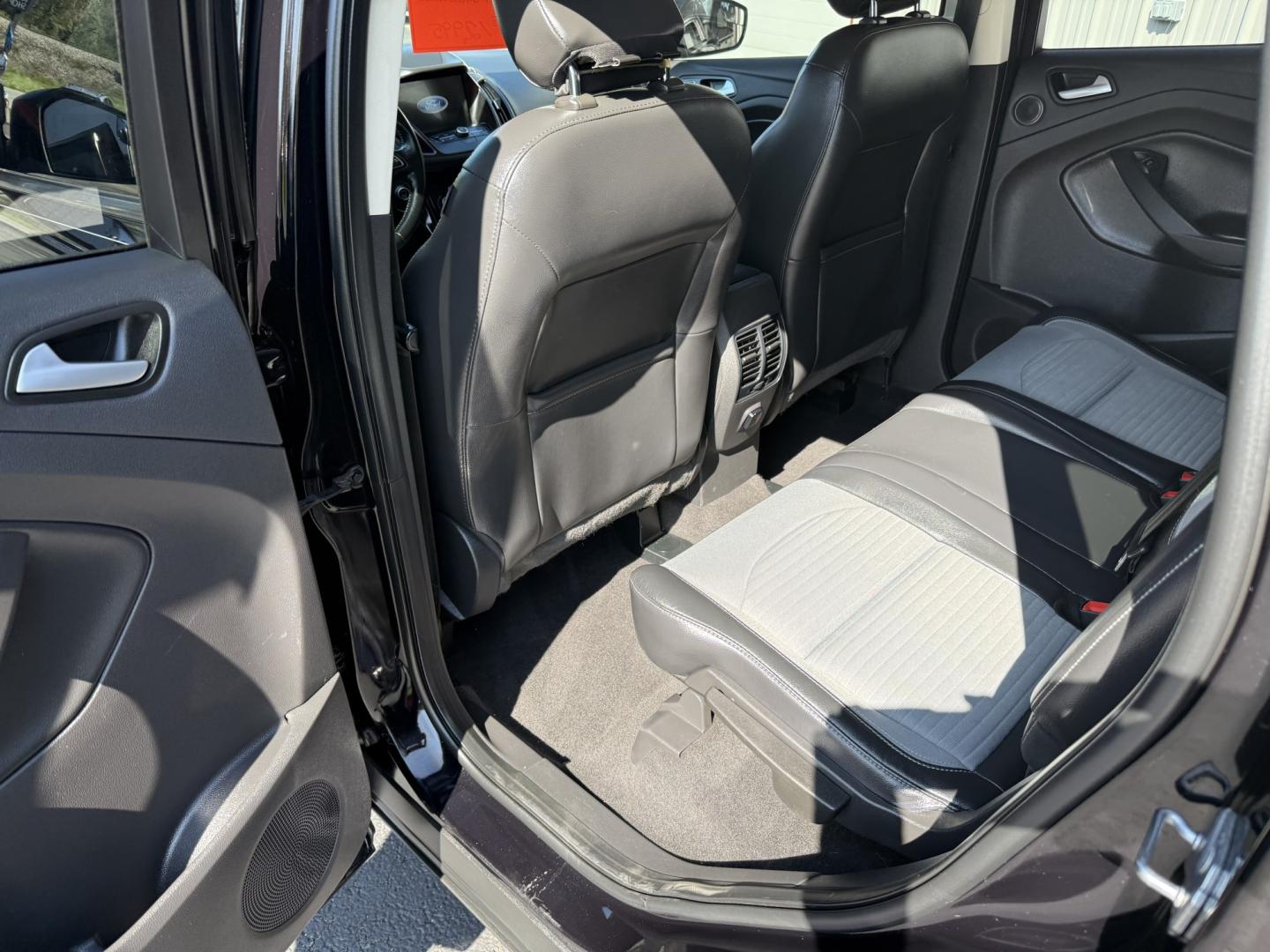 2019 Black Ford Escape SE 4WD (1FMCU9GD7KU) with an 1.5L L4 DOHC 16V engine, 6A transmission, located at 8464 Route 219, Brockway, PA, 15824, (814) 265-1330, 41.226871, -78.780518 - Very clean, sharp 2019 Ford Escape Se 4wd with air condition, power windows and locks, power/heated front seats, and much more. ONLY 84,000 miles. Priced to sell, hurry in this one won't last long. Stop in and see this Ford suv or one of the other many clean, suv's on the lot. Selling vehicles for 5- Photo#7