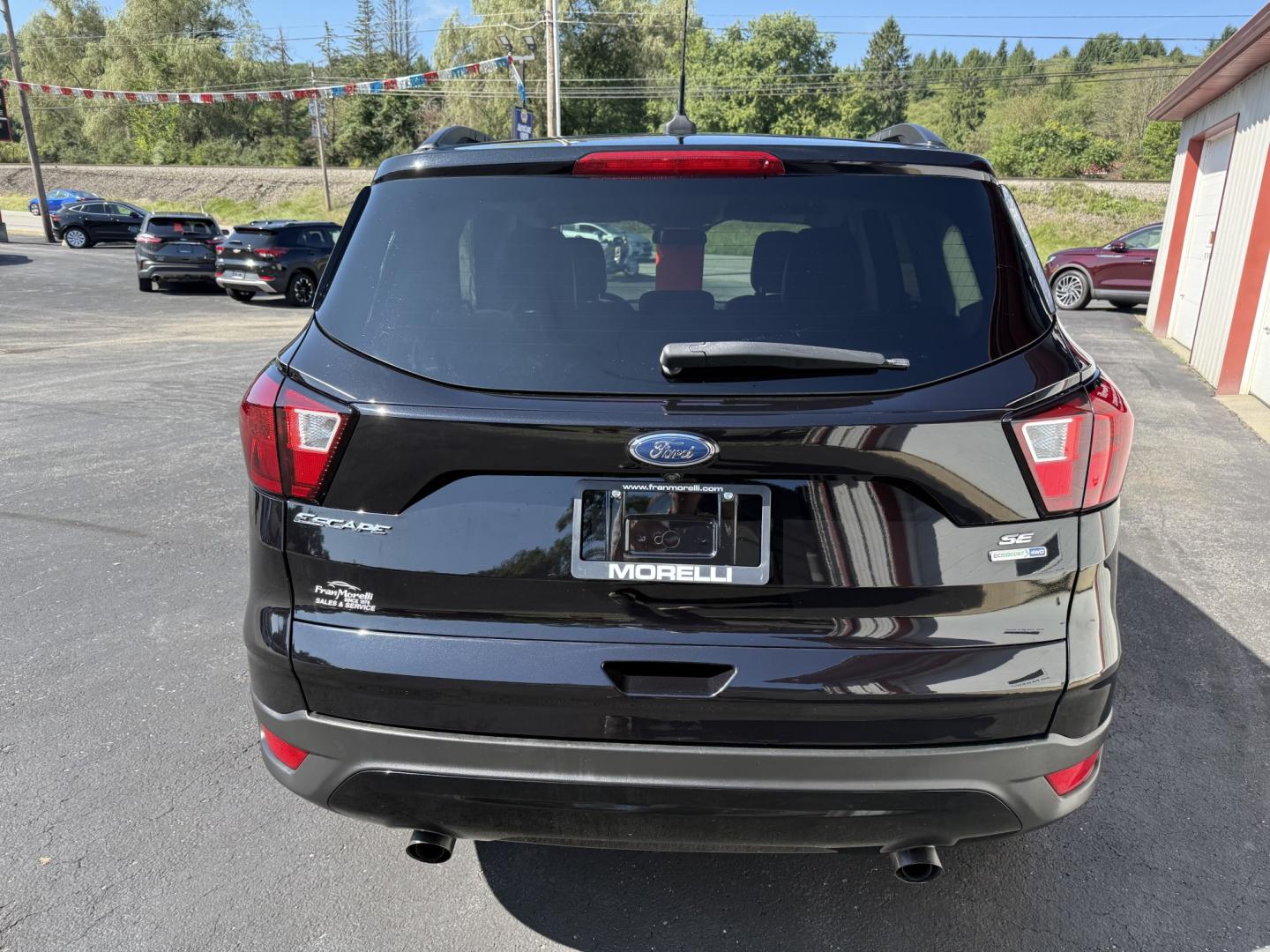2019 Black Ford Escape SE 4WD (1FMCU9GD7KU) with an 1.5L L4 DOHC 16V engine, 6A transmission, located at 8464 Route 219, Brockway, PA, 15824, (814) 265-1330, 41.226871, -78.780518 - Very clean, sharp 2019 Ford Escape Se 4wd with air condition, power windows and locks, power/heated front seats, and much more. ONLY 84,000 miles. Priced to sell, hurry in this one won't last long. Stop in and see this Ford suv or one of the other many clean, suv's on the lot. Selling vehicles for 5- Photo#10