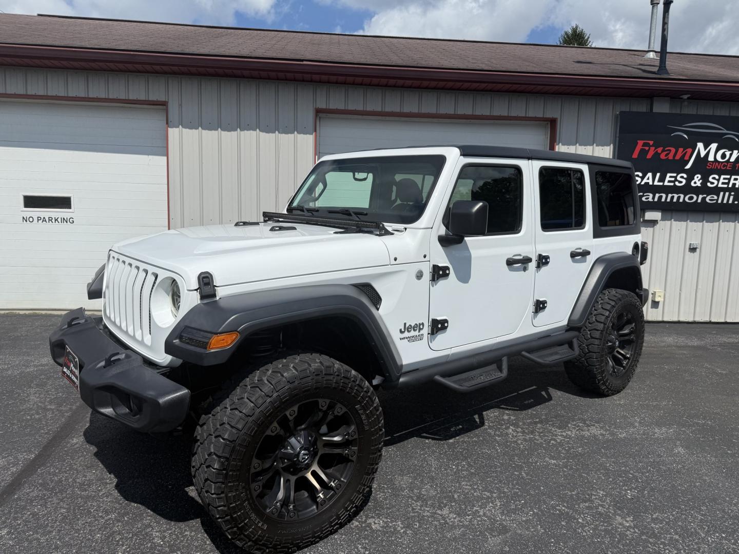2018 White Jeep Wrangler JK Unlimited Sport (1C4HJXDG2JW) with an 3.6L V6 DOHC 24V FFV engine, 6A transmission, located at 8464 Route 219, Brockway, PA, 15824, (814) 265-1330, 41.226871, -78.780518- Photo#0