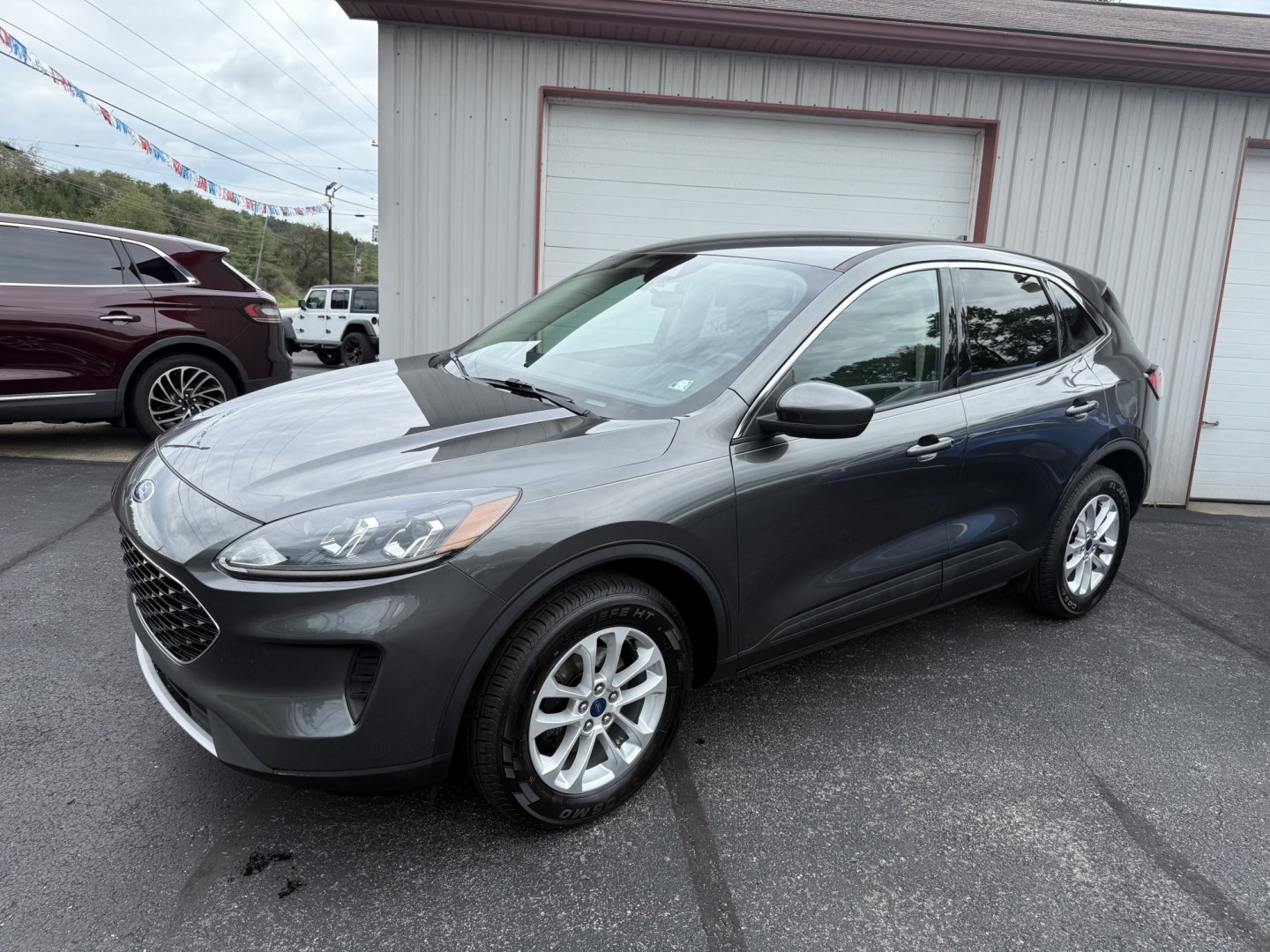 2020 Gray Ford Escape SE AWD (1FMCU9G69LU) with an 1.5L L3 engine, 6A transmission, located at 8464 Route 219, Brockway, PA, 15824, (814) 265-1330, 41.226871, -78.780518 - Very clean, well taken care of 2020 Ford Escape Se with 4wheel drive, air condition, power seat/heated front seats, factory wheels and ONLY 83000 miles. This Ford is priced to sell.- Photo#0