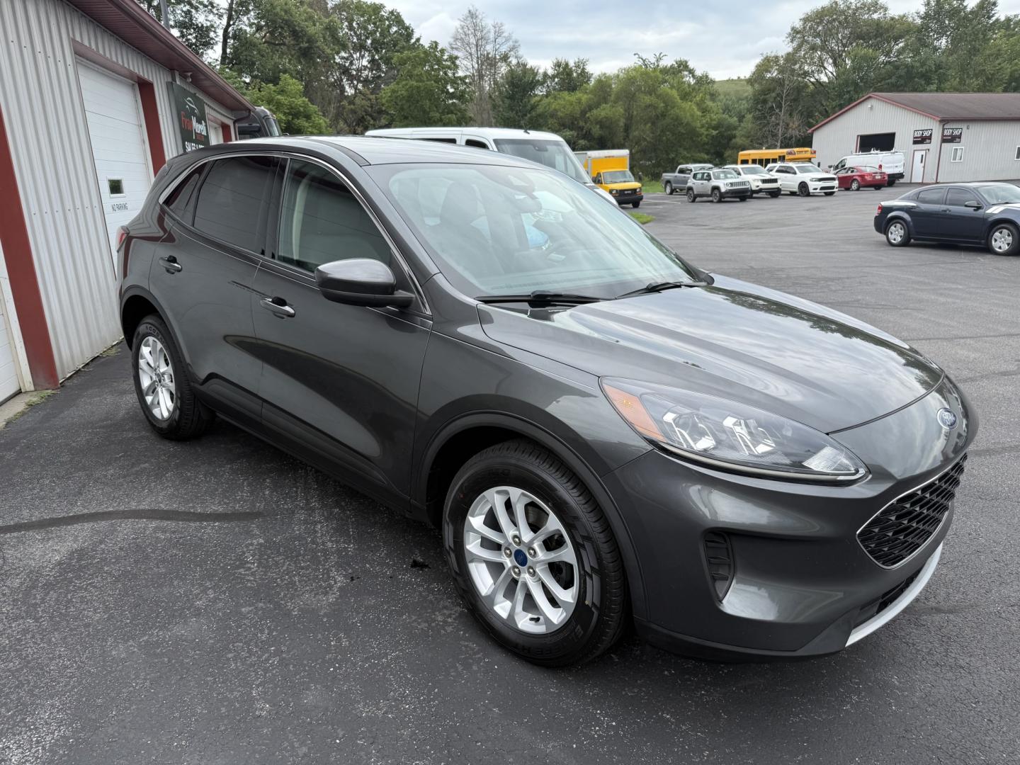 2020 Gray Ford Escape SE AWD (1FMCU9G69LU) with an 1.5L L3 engine, 6A transmission, located at 8464 Route 219, Brockway, PA, 15824, (814) 265-1330, 41.226871, -78.780518 - Very clean, well taken care of 2020 Ford Escape Se with 4wheel drive, air condition, power seat/heated front seats, factory wheels and ONLY 83000 miles. This Ford is priced to sell.- Photo#17