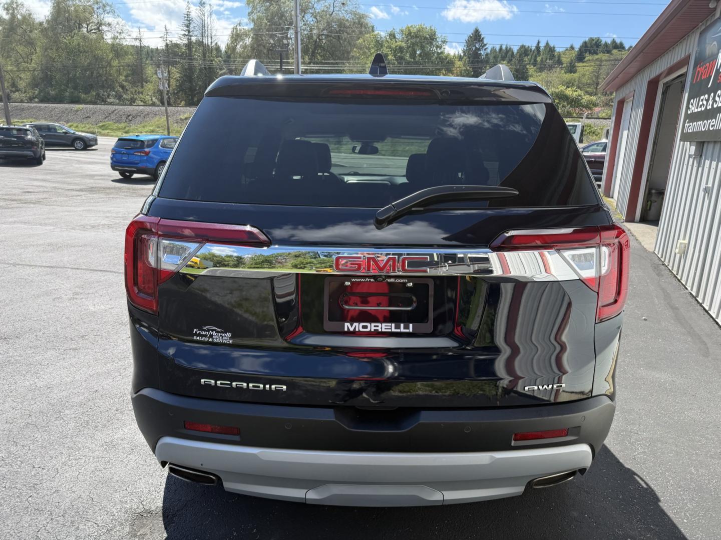 2021 Blue GMC Acadia SLT-1 AWD (1GKKNULS3MZ) with an 3.6L V6 DOHC 24V engine, 6A transmission, located at 8464 Route 219, Brockway, PA, 15824, (814) 265-1330, 41.226871, -78.780518 - Sharp, clean, locally traded in and ready to go. 2021 GMC Acadia SLT all wheel drive with leather, power/heated front seats, captain chairs, 6-passenger, rear a/c, factory wheels and ONLY 56000 miles. Serviced up and priced to sell.- Photo#9