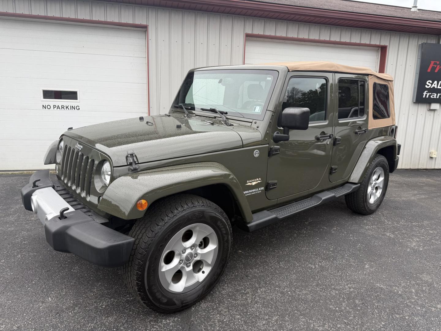 2015 Green Jeep Wrangler Unlimited Sahara 4WD (1C4BJWEG8FL) with an 3.6L V6 DOHC 24V FFV engine, located at 8464 Route 219, Brockway, PA, 15824, (814) 265-1330, 41.226871, -78.780518 - Clean, well taken care of 2015 Jeep Wrangler Unlimited Sahara with 4wd, V6, automatic transmission, air condition, power windows and locks, soft top and good miles. This Jeep is serviced up and ready to go.- Photo#0