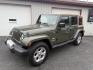 2015 Green Jeep Wrangler Unlimited Sahara 4WD (1C4BJWEG8FL) with an 3.6L V6 DOHC 24V FFV engine, located at 8464 Route 219, Brockway, PA, 15824, (814) 265-1330, 41.226871, -78.780518 - Clean, well taken care of 2015 Jeep Wrangler Unlimited Sahara with 4wd, V6, automatic transmission, air condition, power windows and locks, soft top and good miles. This Jeep is serviced up and ready to go.- Photo#0