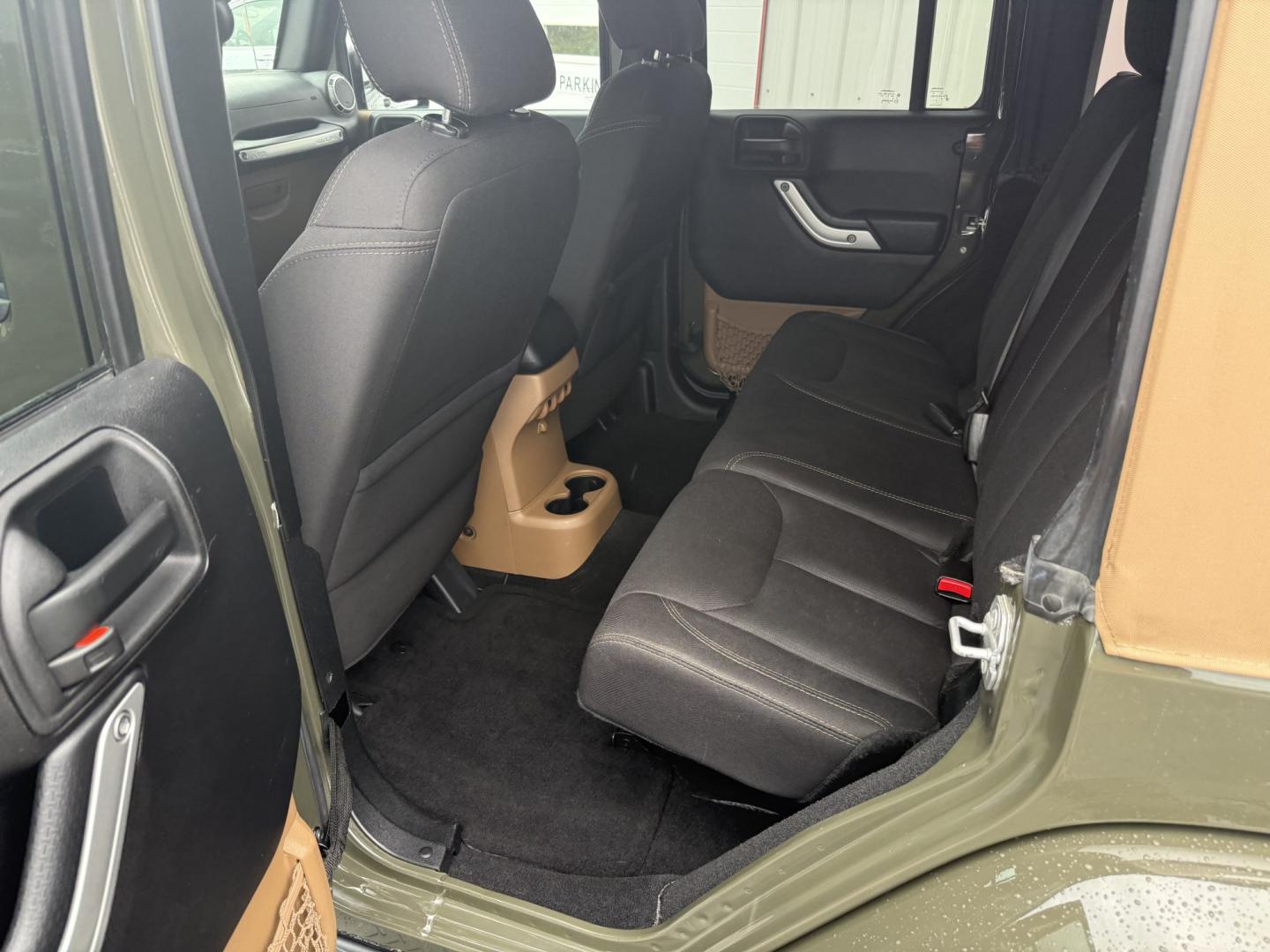 2015 Green Jeep Wrangler Unlimited Sahara 4WD (1C4BJWEG8FL) with an 3.6L V6 DOHC 24V FFV engine, located at 8464 Route 219, Brockway, PA, 15824, (814) 265-1330, 41.226871, -78.780518 - Clean, well taken care of 2015 Jeep Wrangler Unlimited Sahara with 4wd, V6, automatic transmission, air condition, power windows and locks, soft top and good miles. This Jeep is serviced up and ready to go.- Photo#5