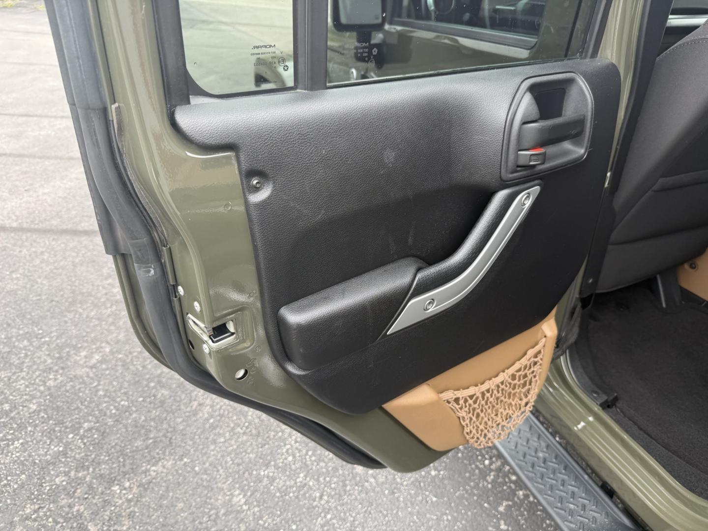 2015 Green Jeep Wrangler Unlimited Sahara 4WD (1C4BJWEG8FL) with an 3.6L V6 DOHC 24V FFV engine, located at 8464 Route 219, Brockway, PA, 15824, (814) 265-1330, 41.226871, -78.780518 - Clean, well taken care of 2015 Jeep Wrangler Unlimited Sahara with 4wd, V6, automatic transmission, air condition, power windows and locks, soft top and good miles. This Jeep is serviced up and ready to go.- Photo#6