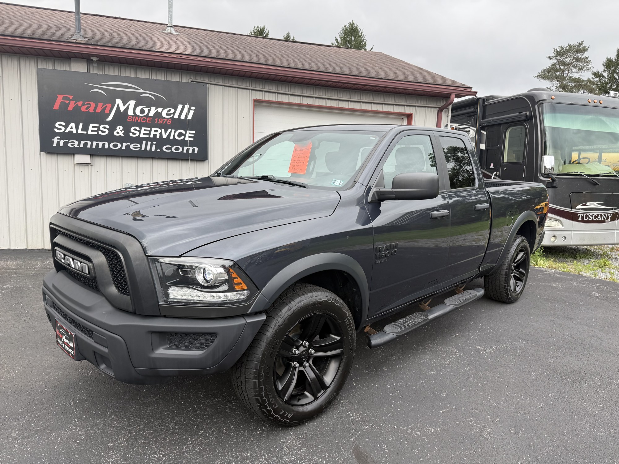 photo of 2021 Ram 1500 SLT Quad Cab 4WD