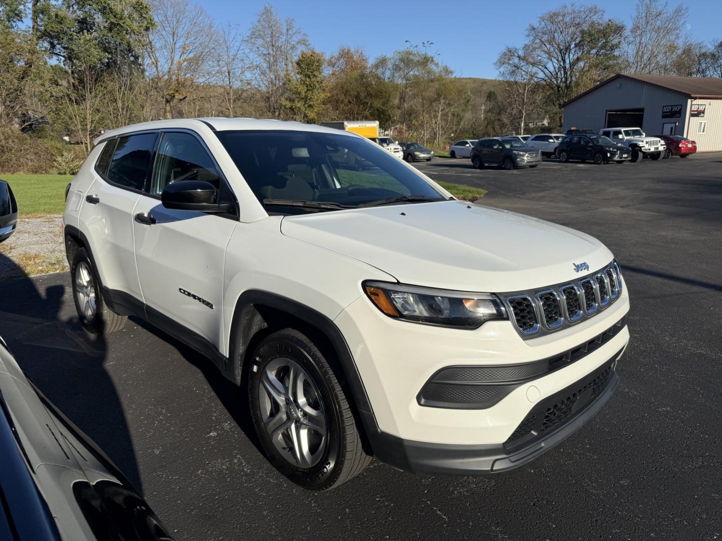 2024 White Jeep Compass Sport (3C4NJDAN8RT) with an 2.0L L4 DOHC 16V TURBO engine, 9A transmission, located at 8464 Route 219, Brockway, PA, 15824, (814) 265-1330, 41.226871, -78.780518 - Great vehicle for a great price! Stop in and see the Morelli boys on this 2024 Jeep Compass Sport 4wd with cloth interior, air condition, power windows and locks, factory wheels, and ONLY 32000 miles. This Jeep is serviced with new brakes and comes with remaining factory warranty. Great price, this- Photo#19